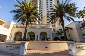 community hoa high rise condo commercial  entrance palm trees pavers plaza
