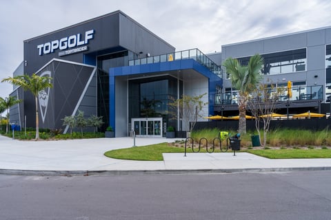 front of top golf building entrance