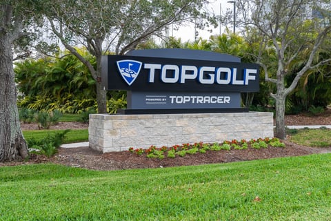 entrance to top golf commercial building